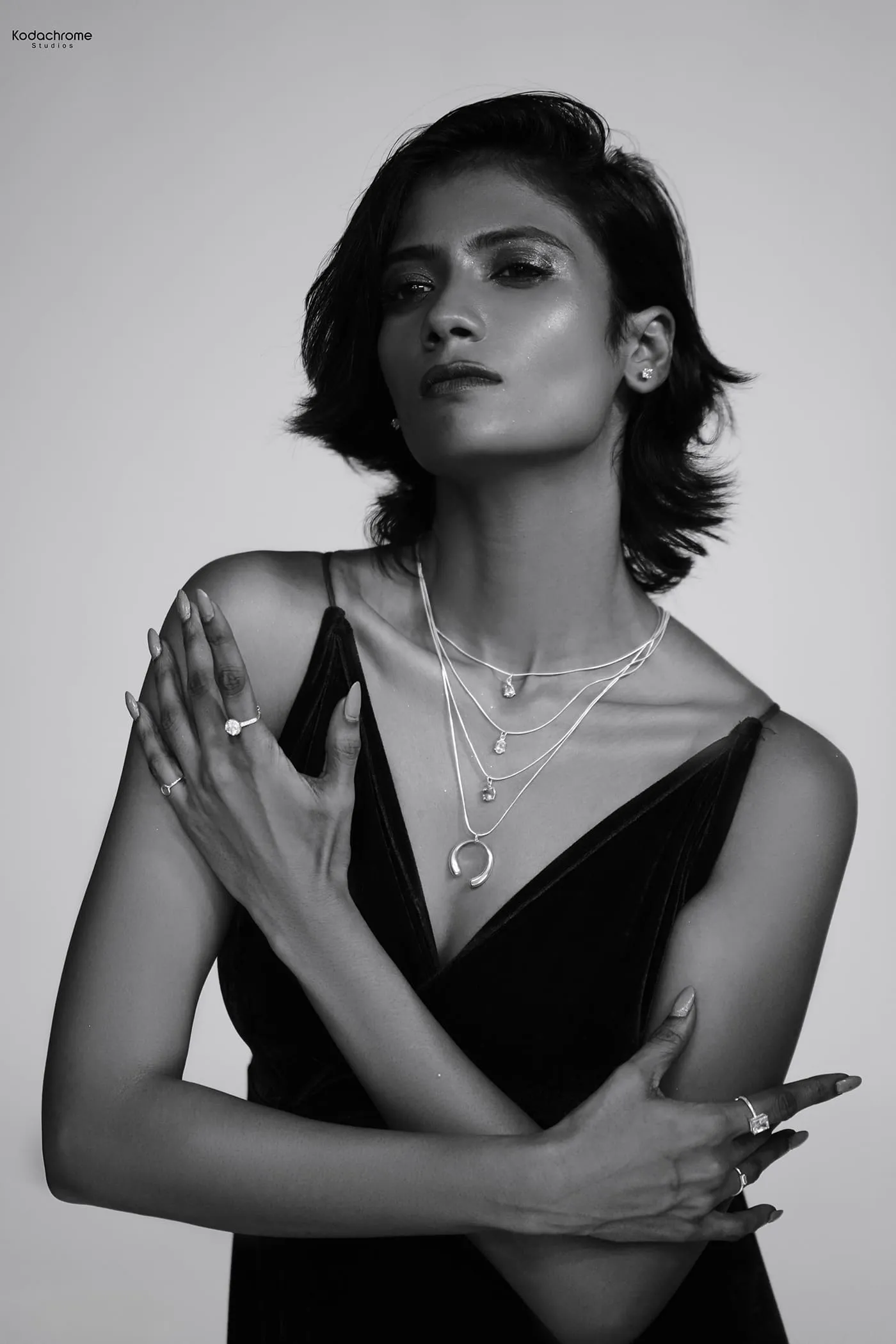 Layered silver on black velvet, shot in black and white.